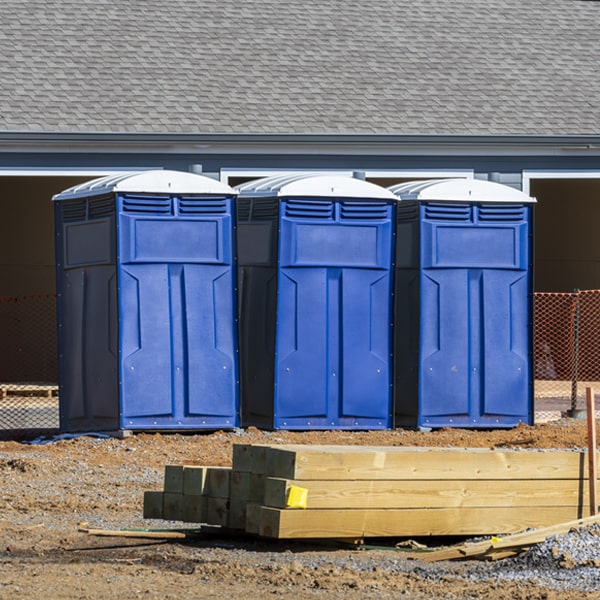 what is the cost difference between standard and deluxe porta potty rentals in Kingston